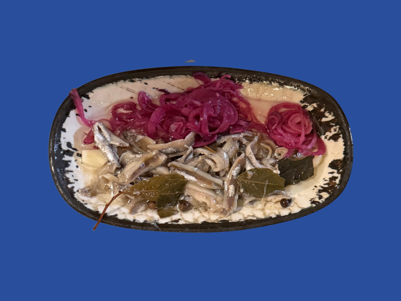 Psari marinated anchovies dish